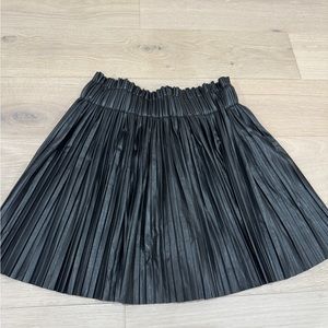 Black pleaded leather skirt
